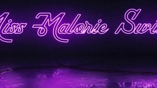 miss malorie switch through green colored glasses